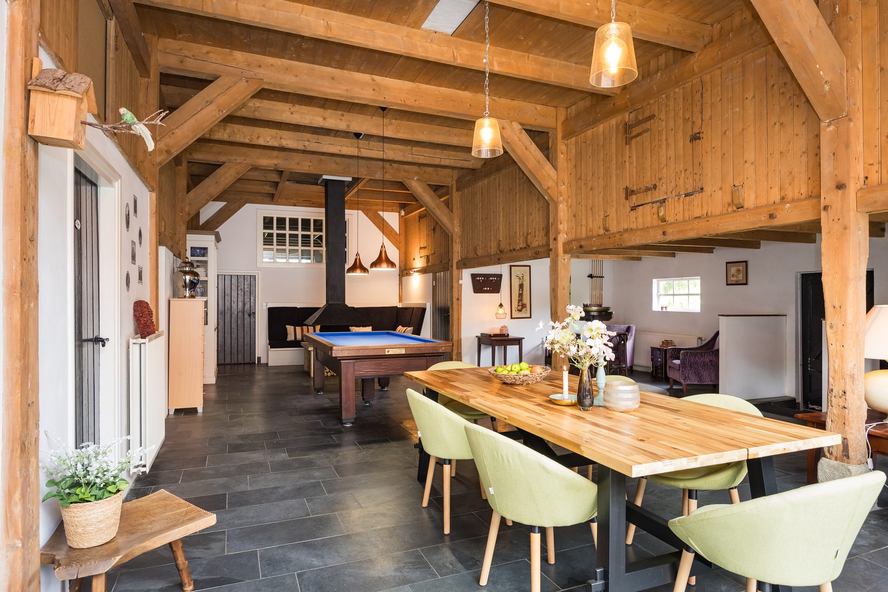 De deel van de woonboerderij, met de gebintconstructie in het zicht